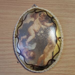 Gold and Brown Cherub Ceramic Wall Art